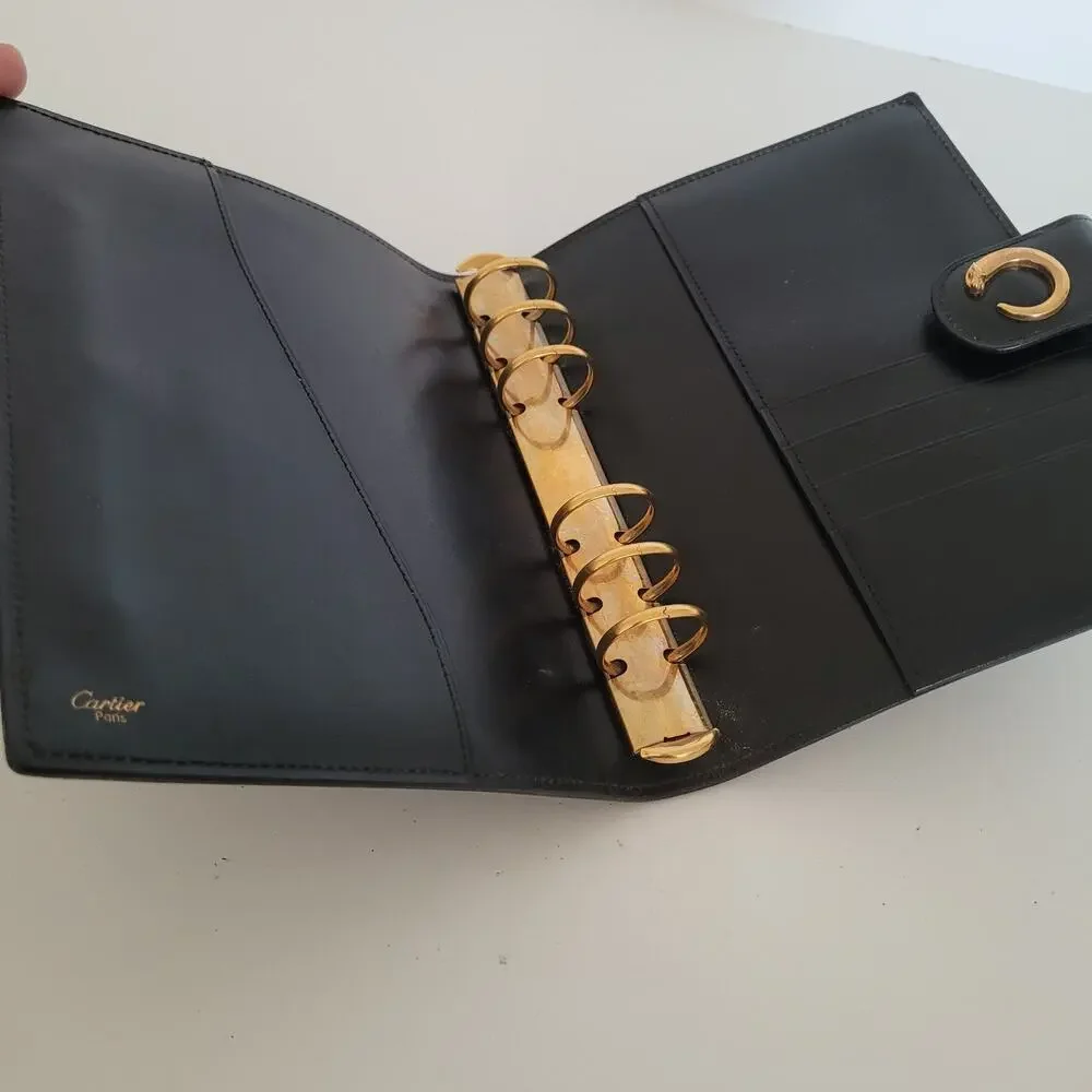 Cartier Black Leather Planner with Gold Panther Accent